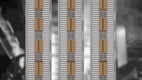 animation of cardboard boxes moving on conveyor belts over warehouse