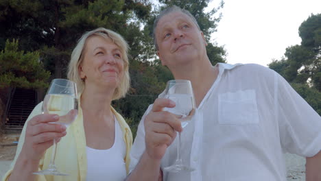 Man-and-Woman-Having-Drink-and-Talk-Outdoor