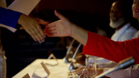 Multi-ethnic business people shaking hands in business seminar in auditorium 4k