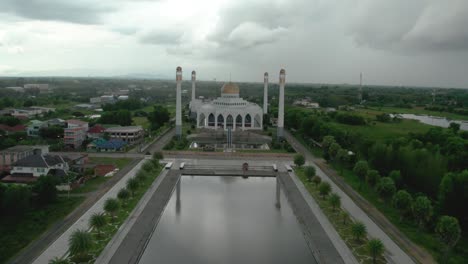 landscape drone camera sunset at mosque of songkhla province,thailand. beautiful grand mosque in ramadan day evening sunset. video nature color 4k resolution.