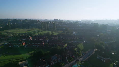 explore dewsbury moore council estate in the uk via drone footage, revealing red-brick housing and the yorkshire industrial landscape on a sunny summer day