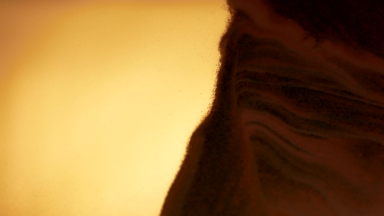 Little grains of sand moving in abstract slow motion