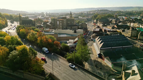 Aerial-footage-of-the-large-market-town-centre-of-Dewsbury-in-West-Yorkshire-in-the-UK-showing-the-historical-town-centre-and-townhall