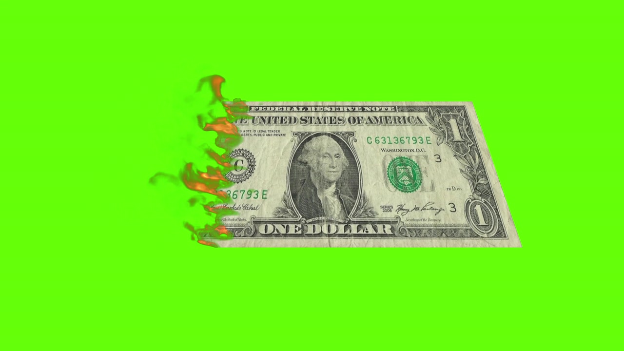 Palava yhden dollarin seteli vihreällä taustalla