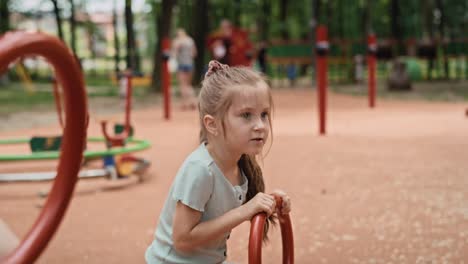 caucasian girl have fun at the playground.