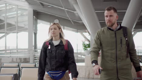 couple waiting at airport