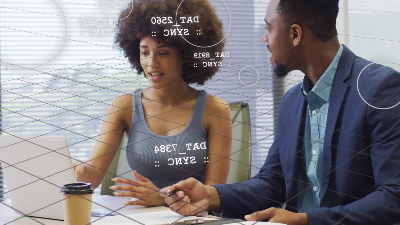 Woman initiating discussion gesturing, man marking papers, reviewing business data, HUD overlaying