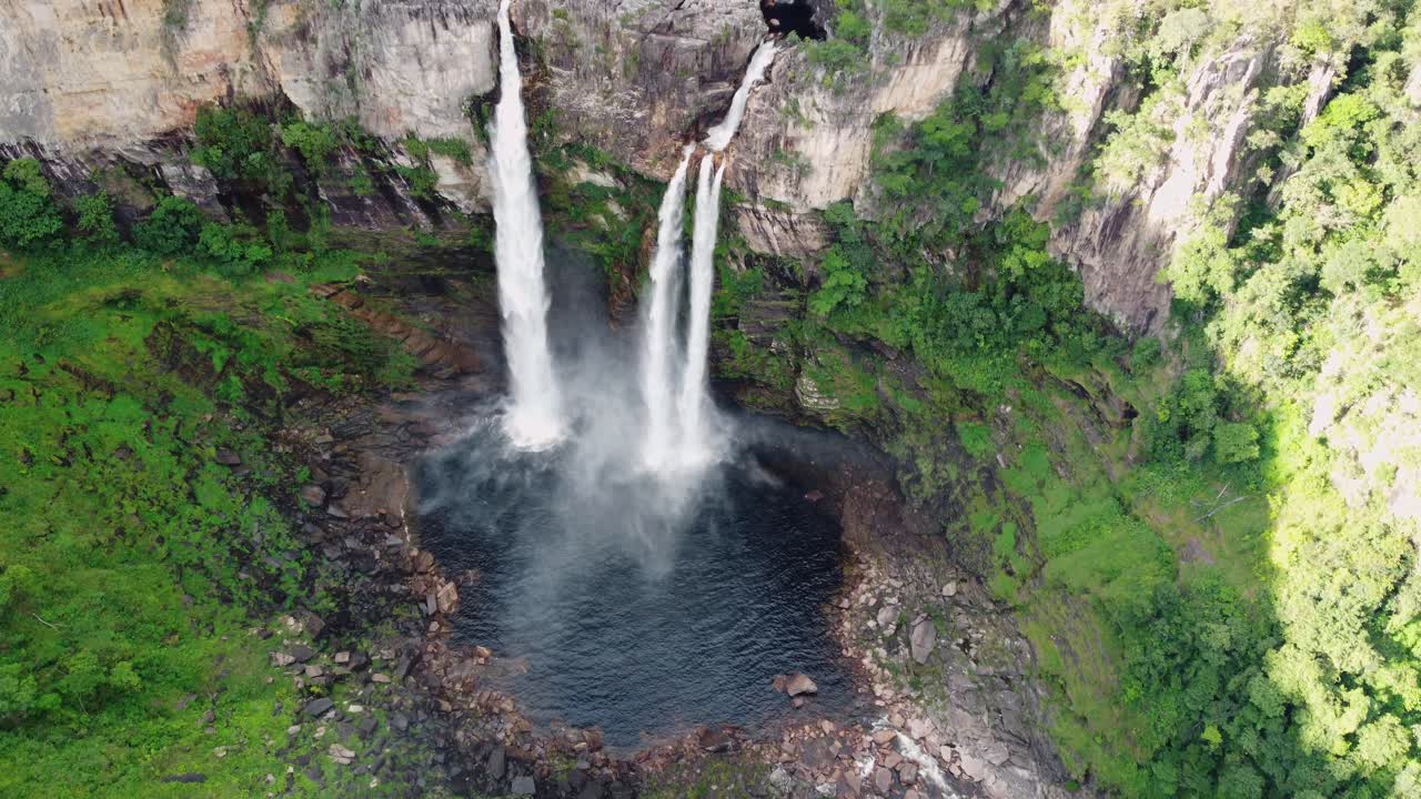 Aerial View of Stunning Waterfalls in Lush Tropical Jungle