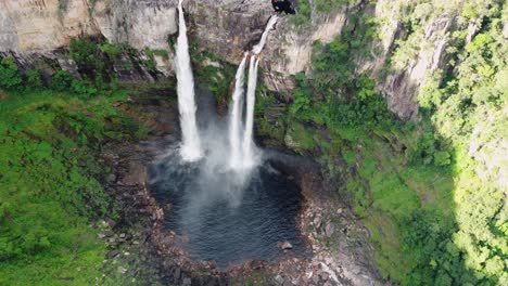 aerial view of stunning waterfalls in lush tropical jungle