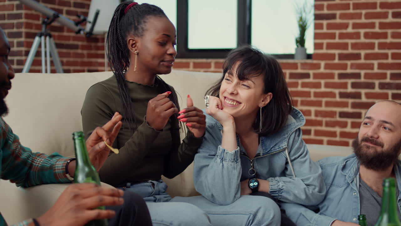Diverse people talking and bonding together at home