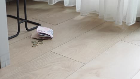 money and coins on the floor