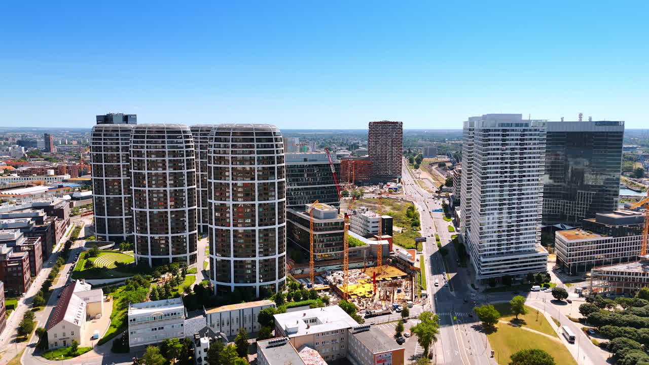 Modern beautiful architecture of Bratislava, Slovakia. Aerial view on the construction site near the stunning towers of New City Center.