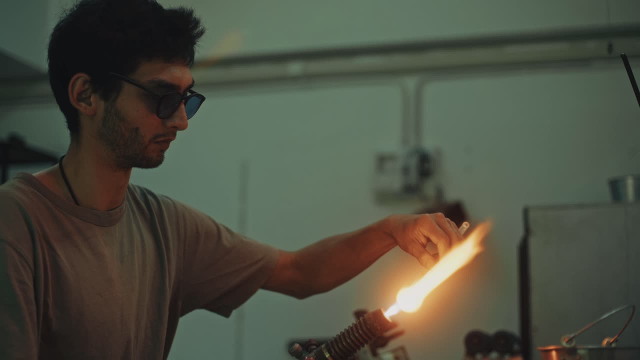 Glassblowing artisan at work