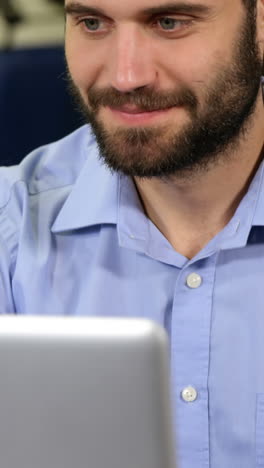 physiotherapist working on laptop