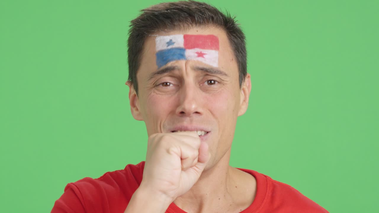 Very nervous man supporting panamanian team during a difficult match