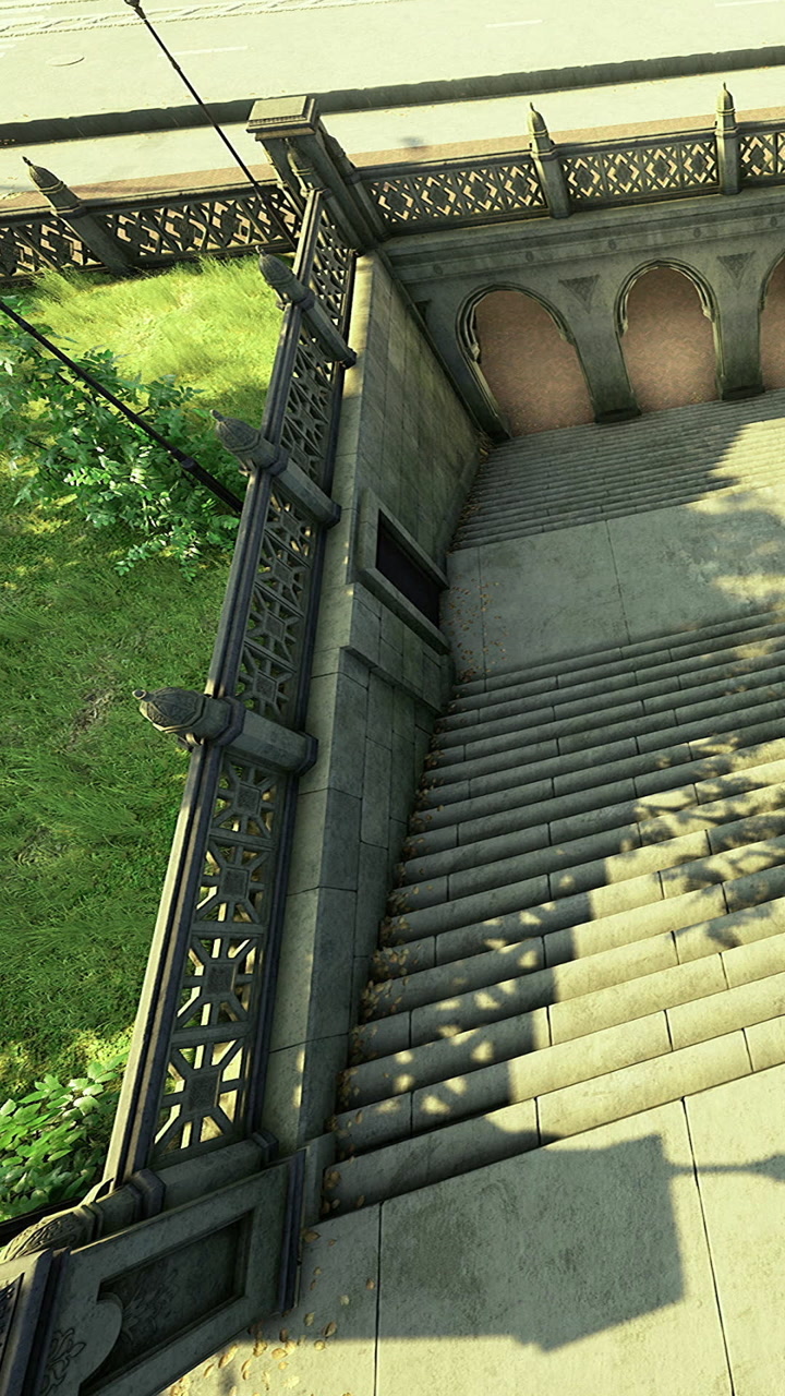 Stunning stone staircase leads to a serene garden pathway under sunlight