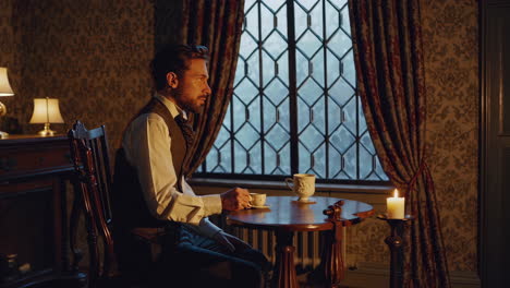 victorian gentleman enjoying a quiet moment by candlelight