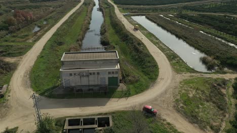Beautiful-drone-footage,-hydroelectric-plant-next-to-the-river