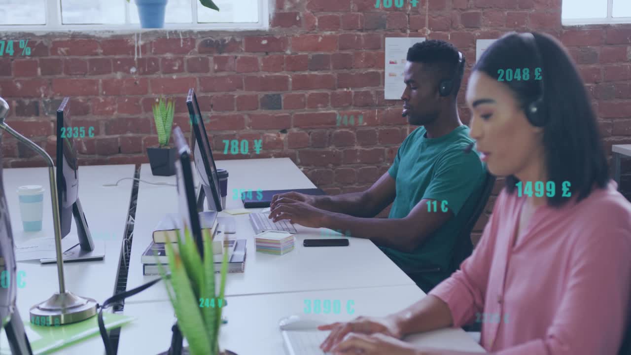 Two colleagues typing and speaking into headsets, generating finance overlays for metric monitoring