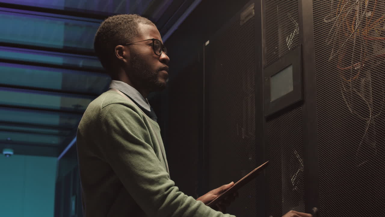 IT Engineer Checking on Server Room