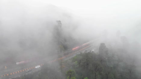 Aerial-Birds-Eye-View-Of-Muree-Expressway-Through-Dense-Mist