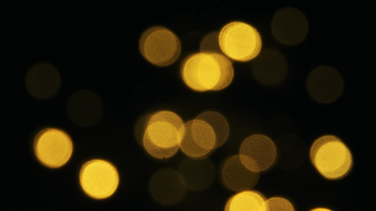 abstracción. abstracción. luces redondas borrosas son amarillas. navidad. decoración.