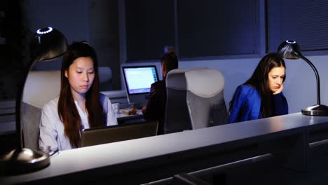 female executives working at desk