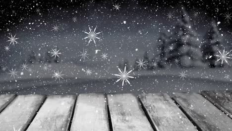 Animation-of-snow-falling-over-christmas-fir-trees