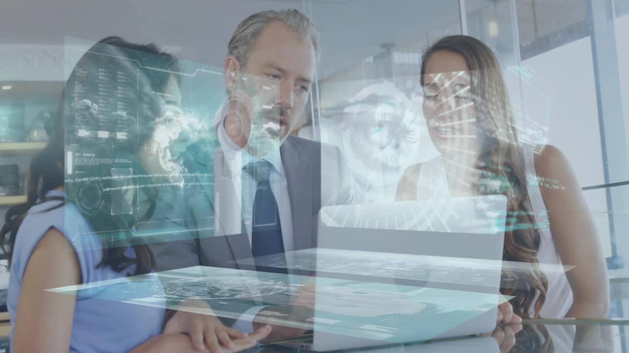 Collaborating with futuristic animation, business professionals using laptop in office