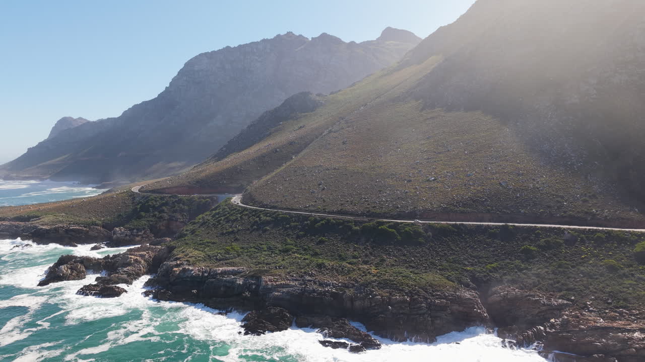 Chapman's Peak Drive Toll Road Winds Between Noordhoek And Hout Bay On The Atlantic Coast, South Africa. Aerial Drone Shot