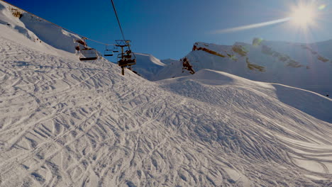 ski area in the swiss alps with people and chairlifts in the winter ski area of beckenried