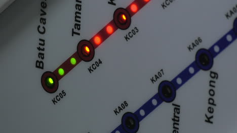 close up view of lighting green and red bulbs on train map kuala lumpur malaysia