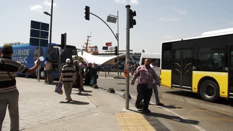a bus with the picture of recep tayyip erdogan is passing by a road during his political campaign for the presidential elections in istanbul, turkey