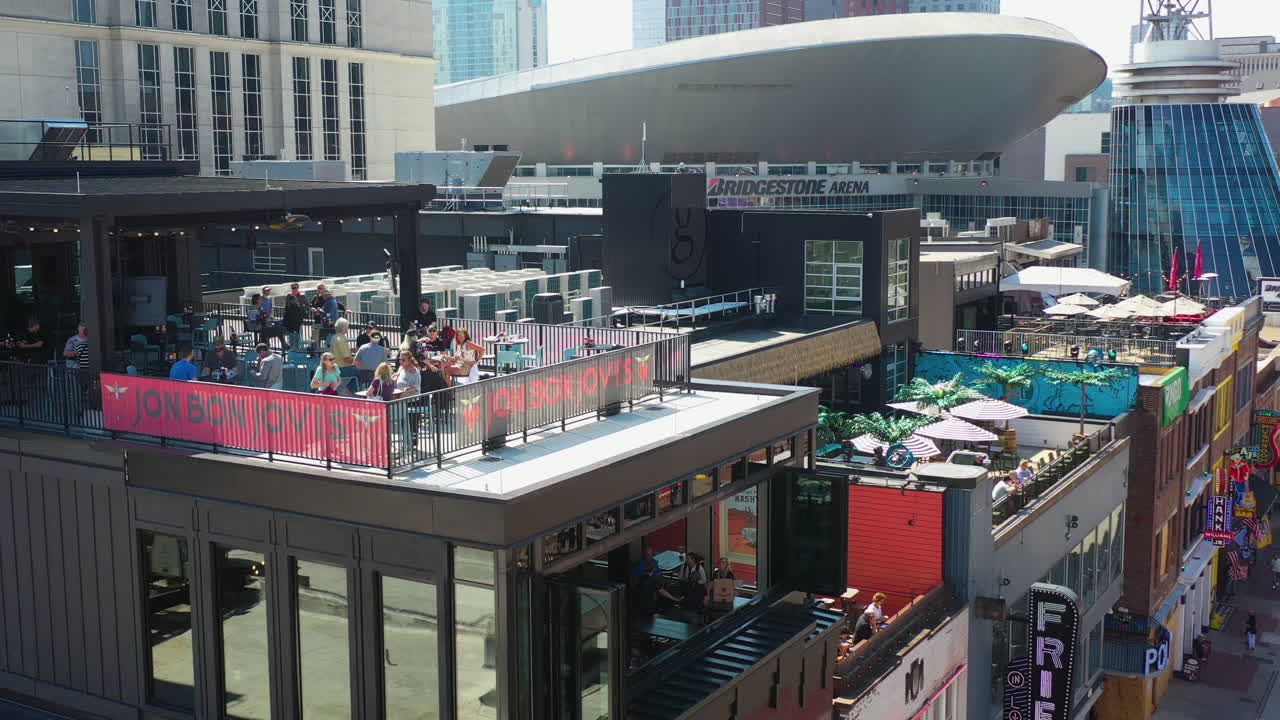 Aerial View of Nashville's Broadway: Honky Tonks, Rooftop Bars, and City Skyline