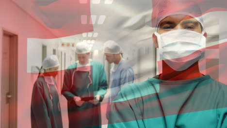 animation of flag of switzerland waving over surgeons in operating theatre