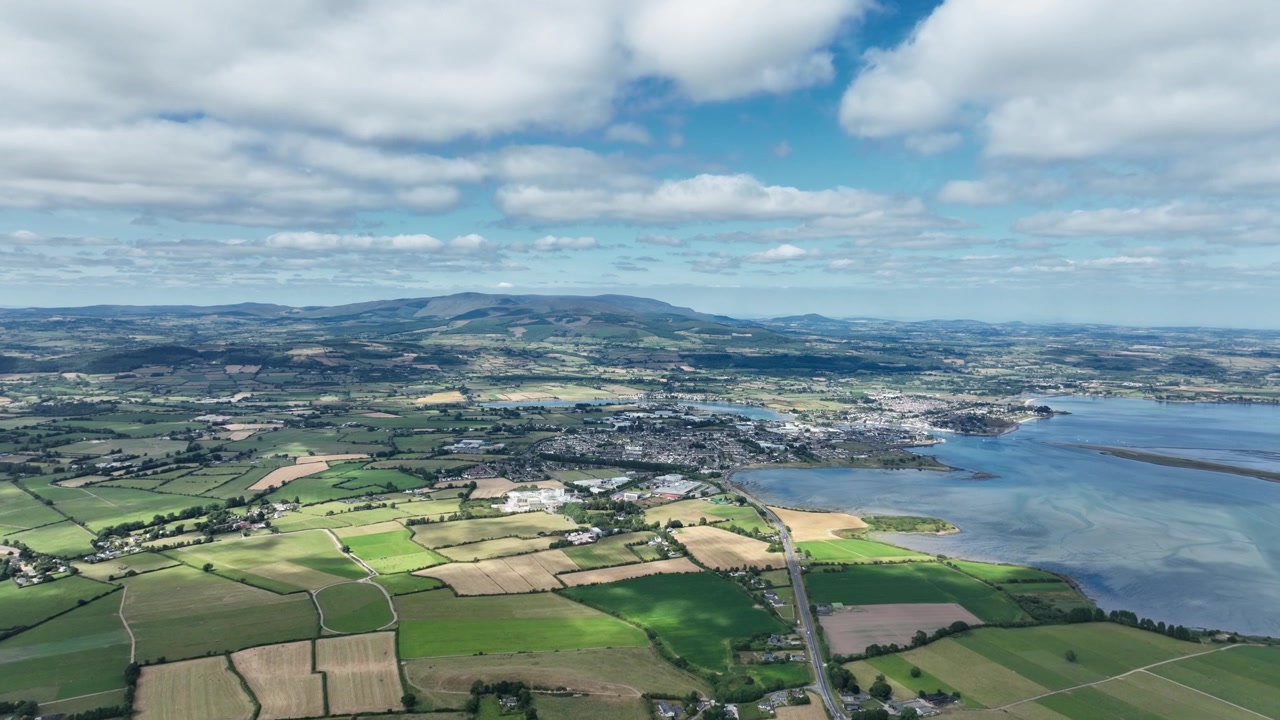 Epic Aerial Ireland Dungarvan Bay and the fertile lands of County Waterford Ireland, Dungarvan Town bustling tourist and food town in the shadow of the majestic Comeragh Mountains