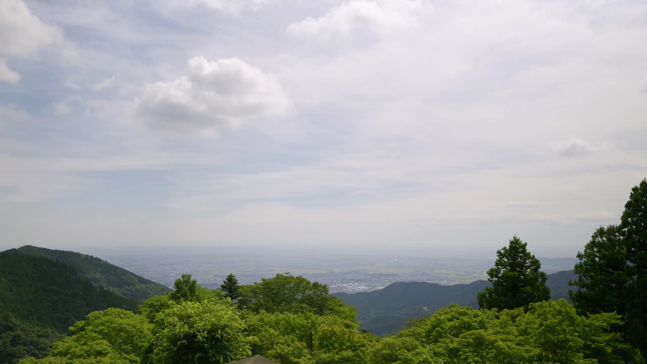 Beautiful panorama view out over landscape below from high above viewpoint in Japan