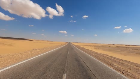 highway in the middle of the desert in egypt