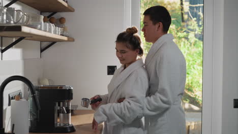 couple making coffee in the morning