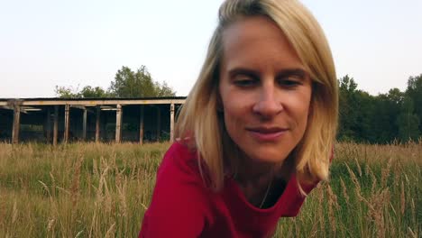 amazing slow motion cinematic shot innocent little cute girl picks flower.shooting for romantic valentines day. gimbal foto video shoot on lost places in wild nature 1080, 24p by philipp marnitz