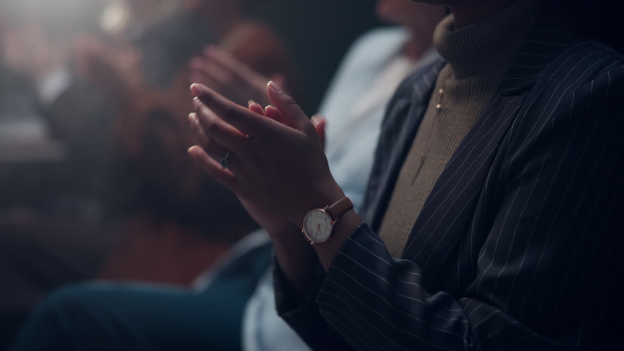 People clapping at an event