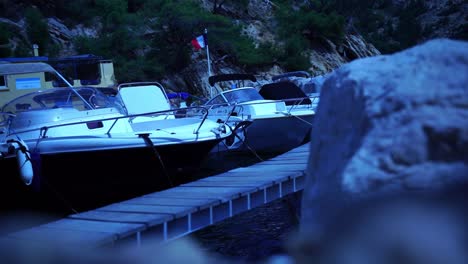 Boats-for-hire-in-France-at-a-small-port-with-a-rocky-coast