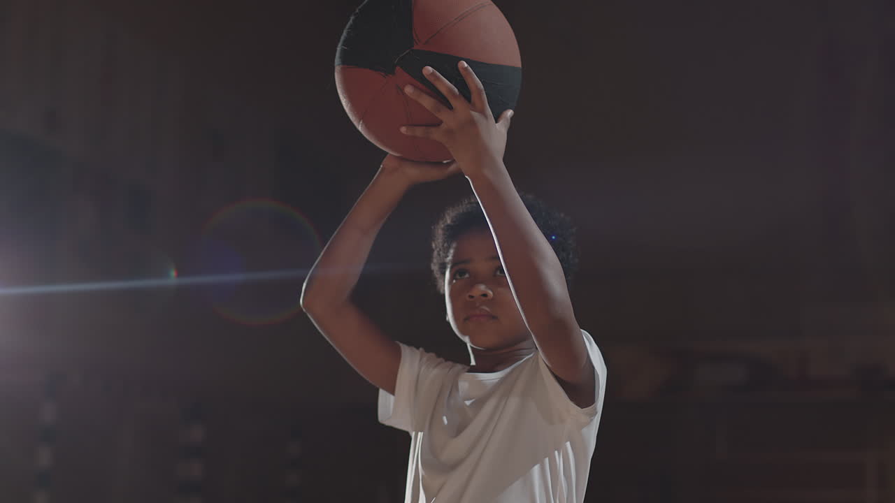 African-American Boy Aiming Basketball