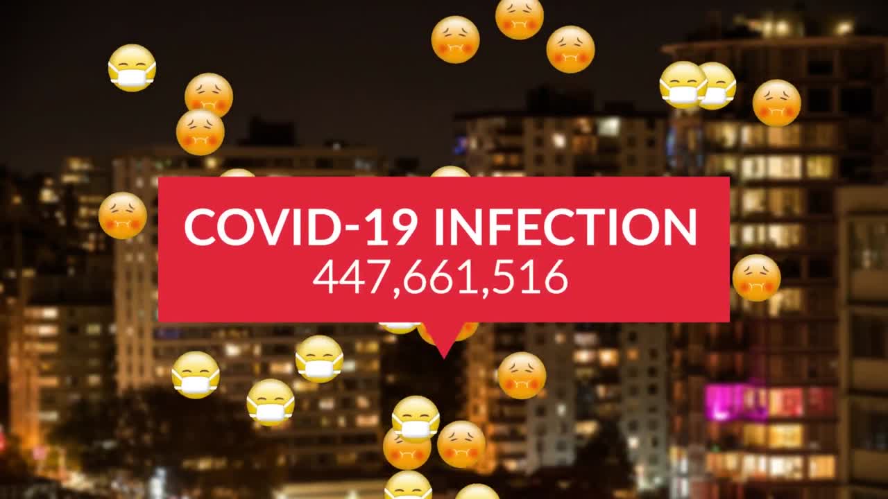 코로나 19 데이터와 이모지 아이콘의 애니메이션이 도시 풍경 위의 얼굴 마스크에 있습니다.