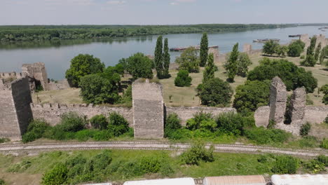 4k serbia danube smederevo fortress aerial slowly lifting up to reveal the river in the background