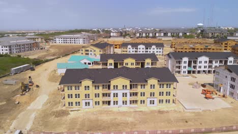 Sideways-Aerial-Drone-View-of-Apartment-Home-Residential-Building-Construction-Site-In-Austin,-Texas,-USA