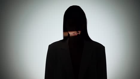 anonymous silhouette of a woman with light streaks