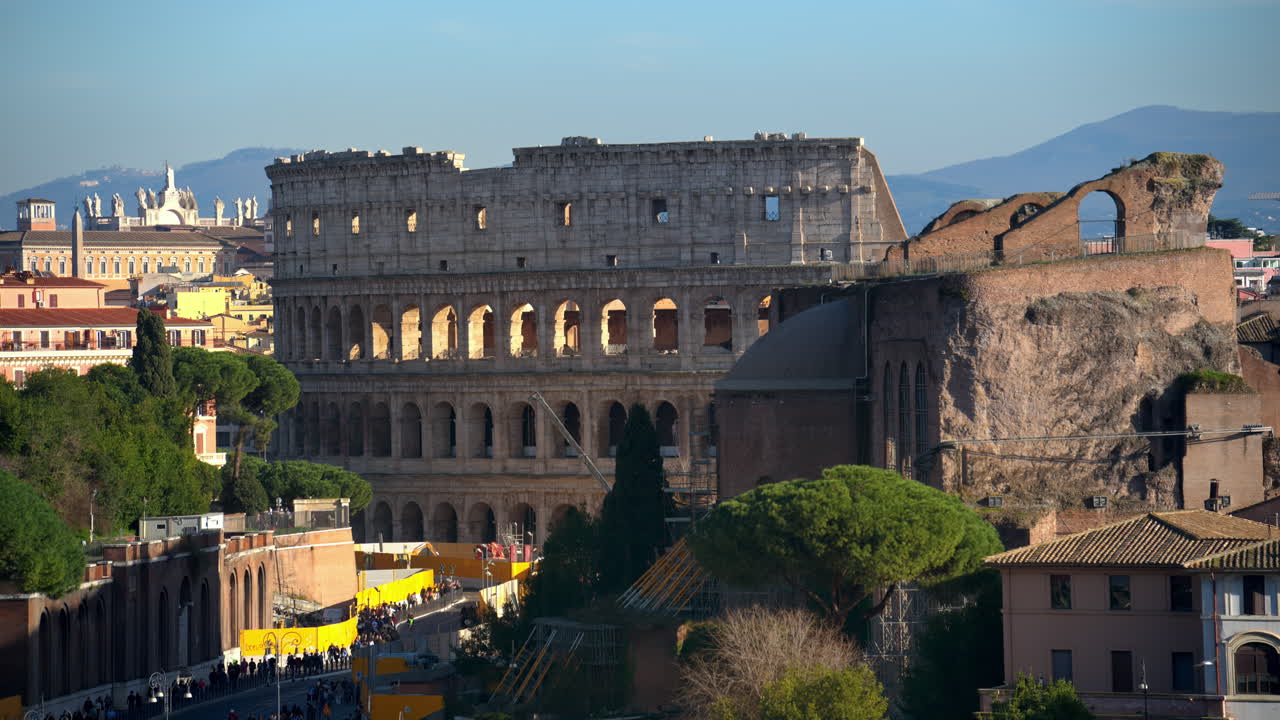 Distant view of the Colosseum with city view in the background, Rome, Italy