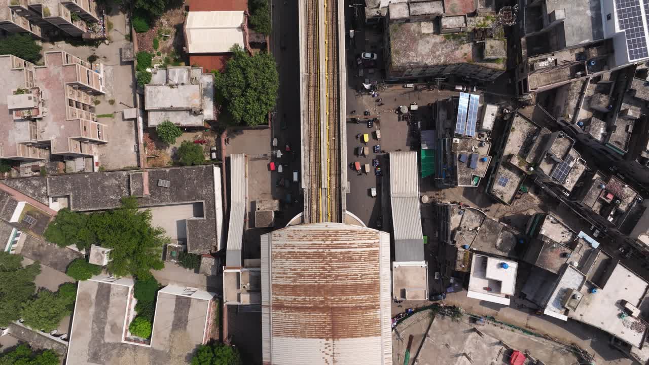 Top Down Aerial View of Traffic at Subway Station in Lahore, Pakistan