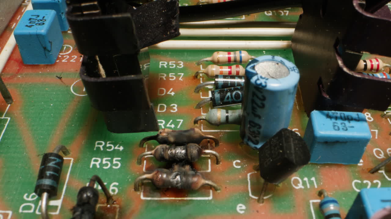 Radio parts of the old amplifier, vintage transistors and chips, hi-fi vintage audio player close up.
